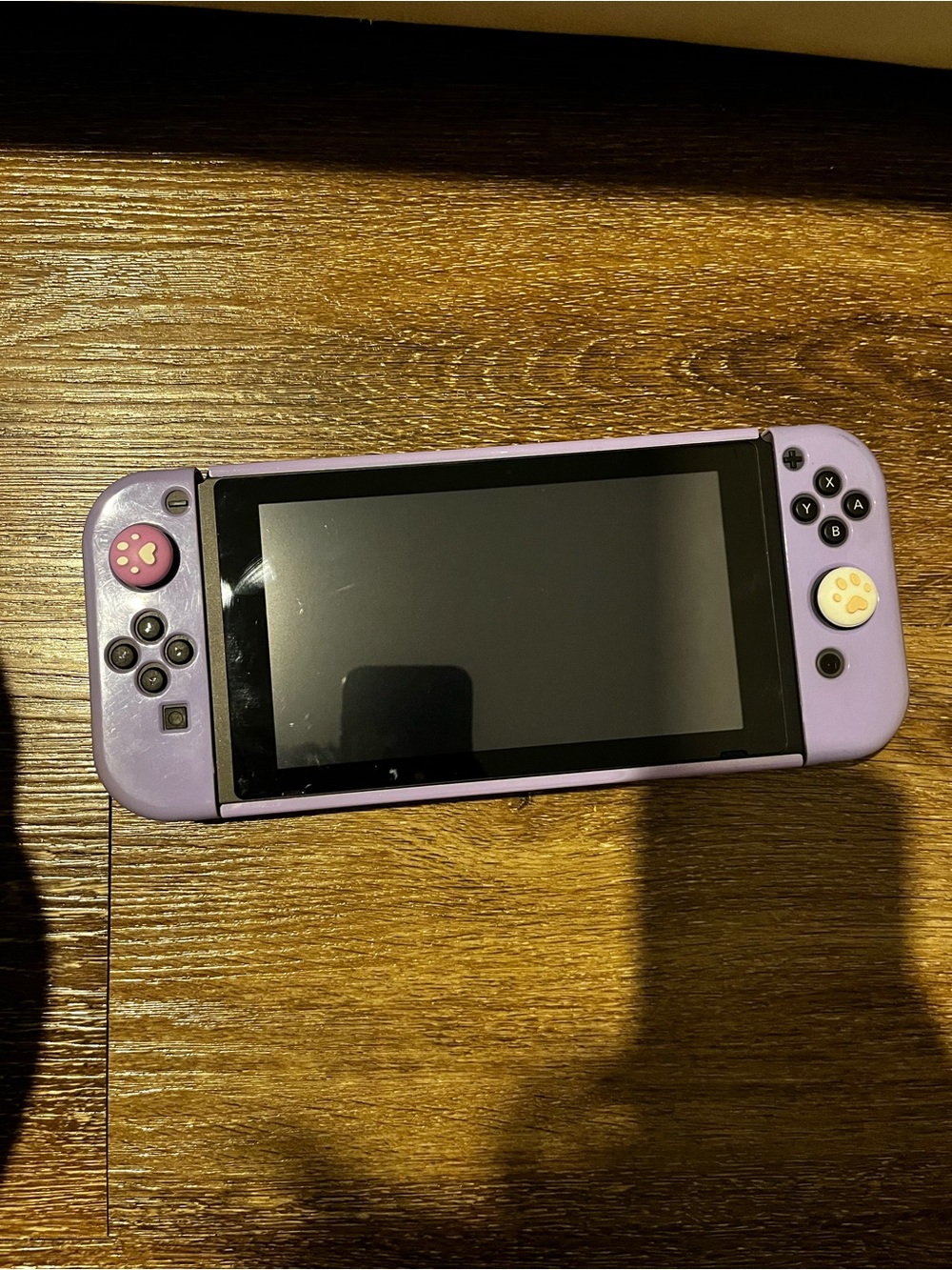 Nintendo switch Lavender Handheld Console with Paw Grip Caps